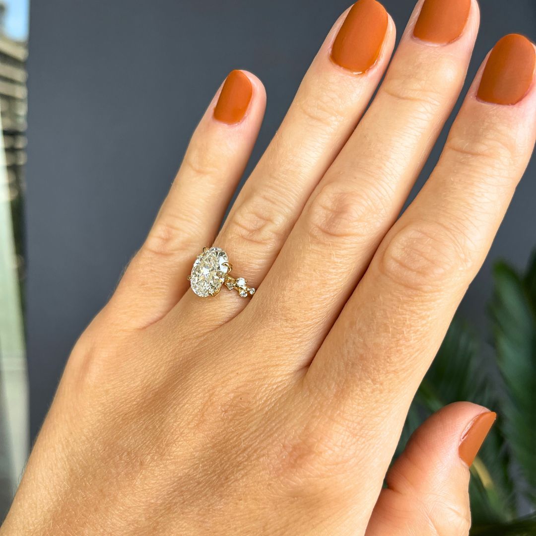 Oval Diamond Engagement ring with a vine shank