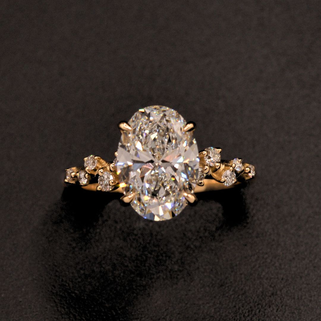 Oval Diamond Engagement ring with a vine shank