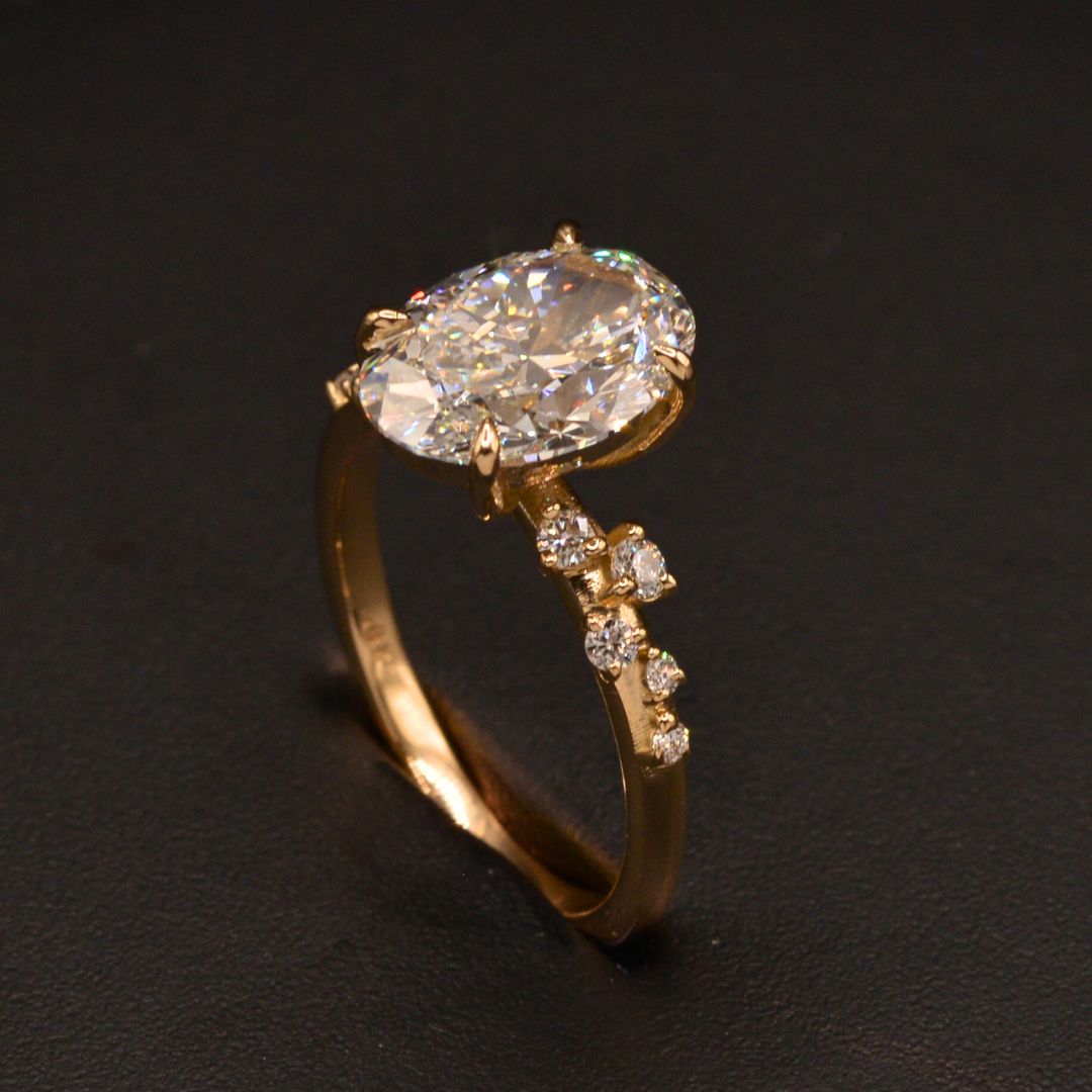 Oval Diamond Engagement ring with a vine shank