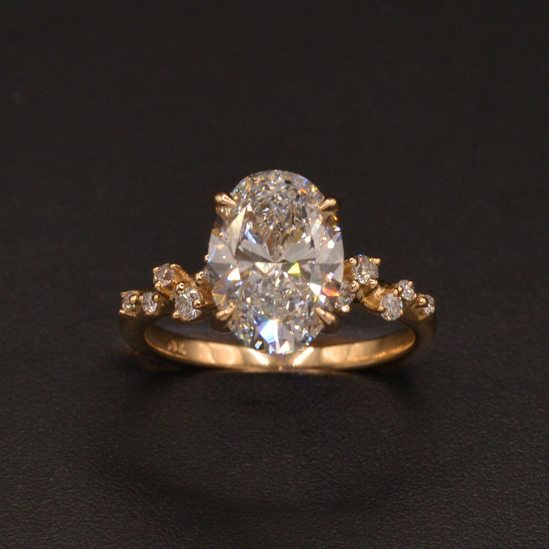 Oval Diamond Engagement ring with a vine shank