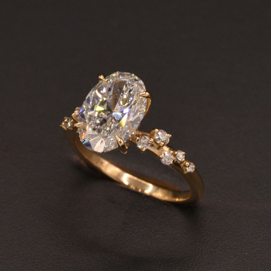 Oval Diamond Engagement ring with a vine shank