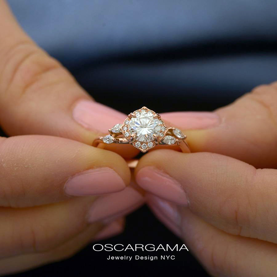 Rose gold engagement ring vintage inspired halo with a twist band in a hand