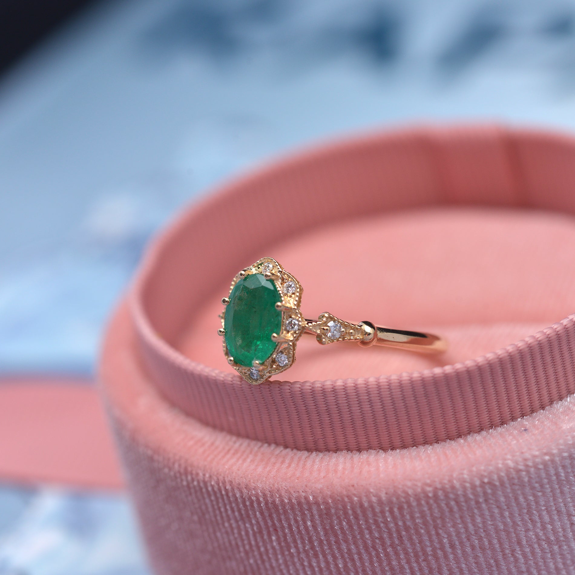 Natural oval green emerald engagement ring