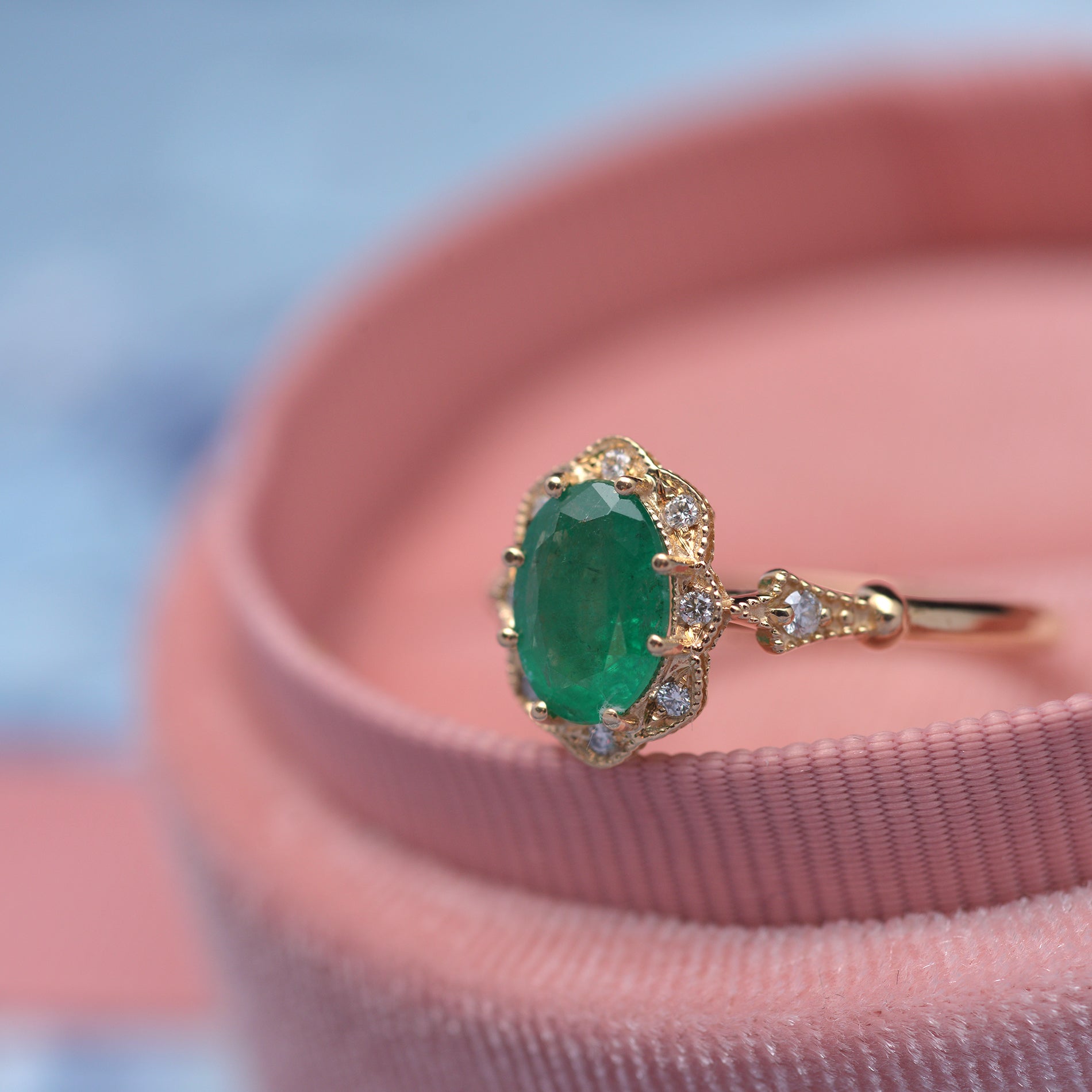 Natural oval green emerald engagement ring