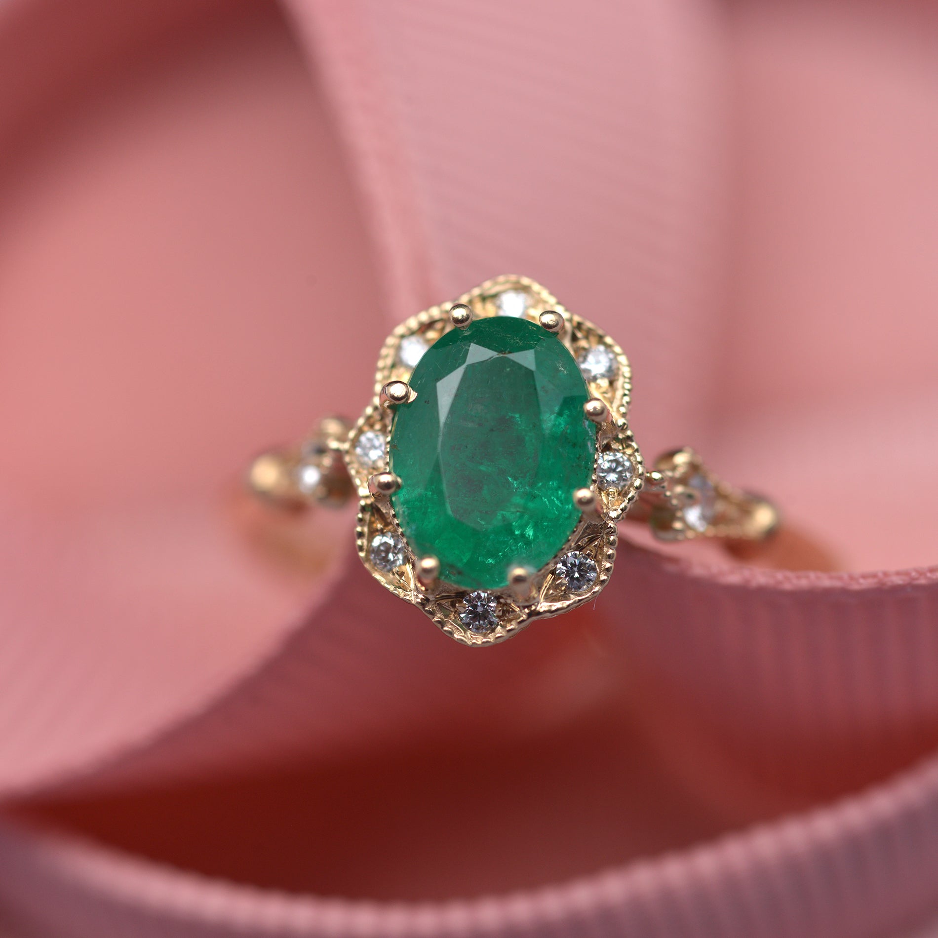 Natural oval green emerald engagement ring