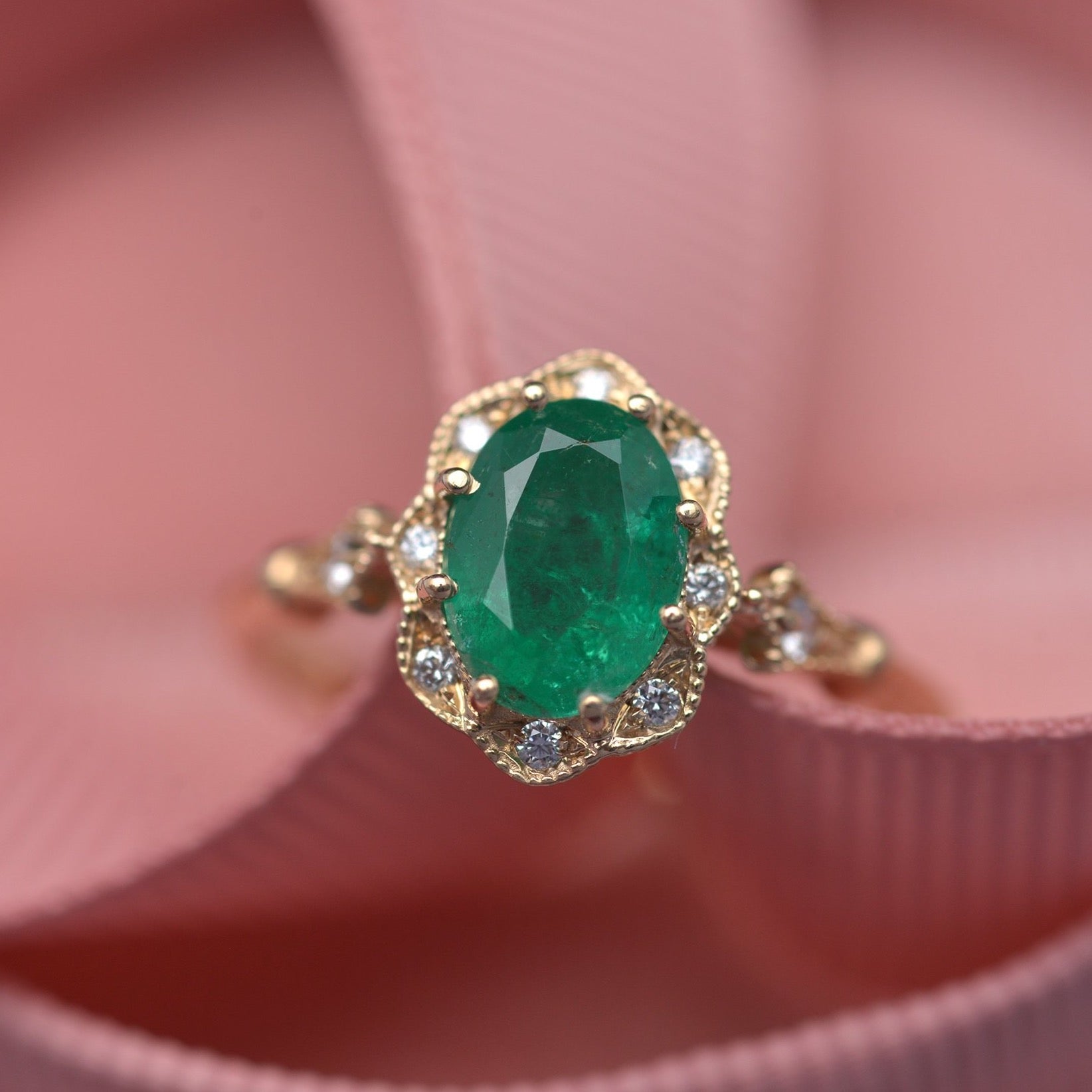 Natural oval green emerald engagement ring