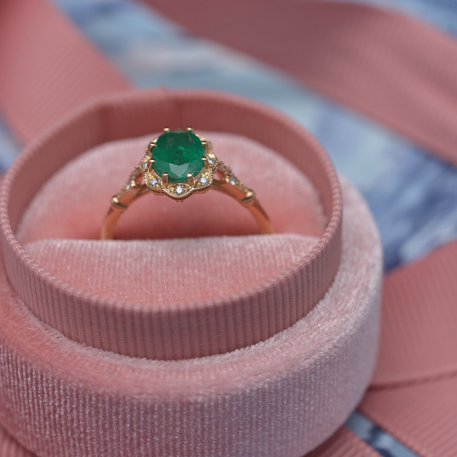 Natural oval green emerald engagement ring