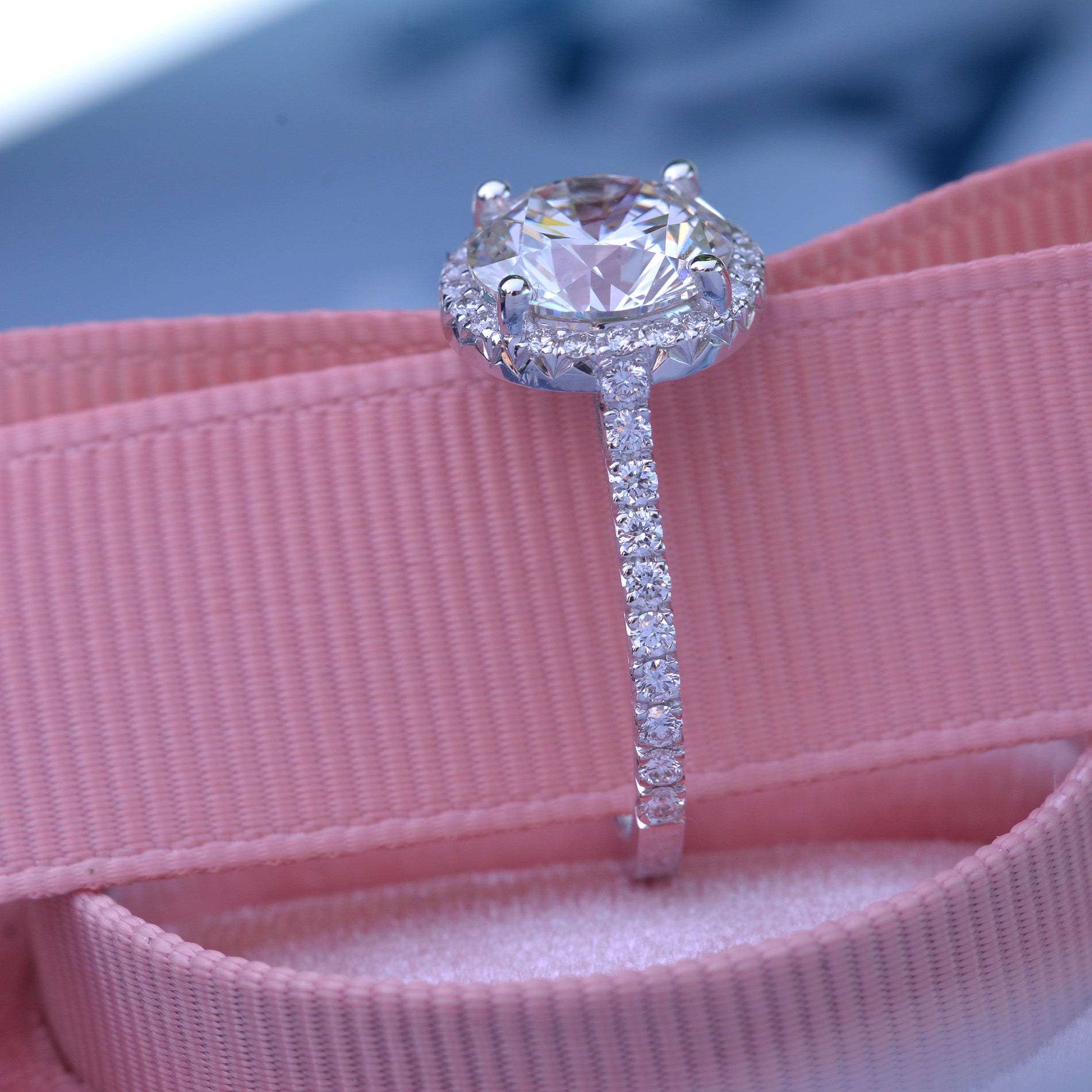 3 carat oval Halo engagement ring french cut pave in white gold