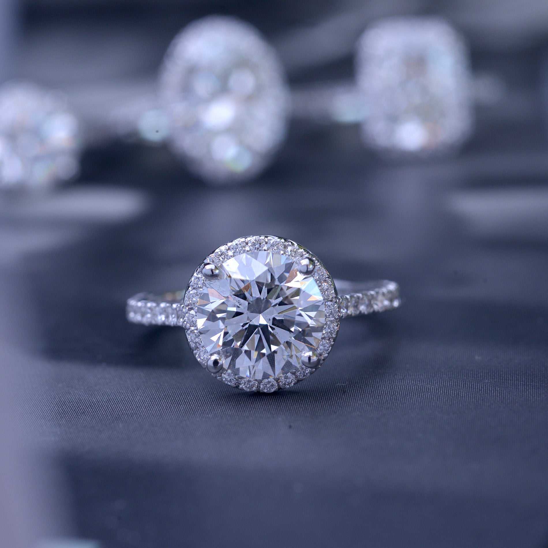 3 carat oval Halo engagement ring french cut pave in white gold