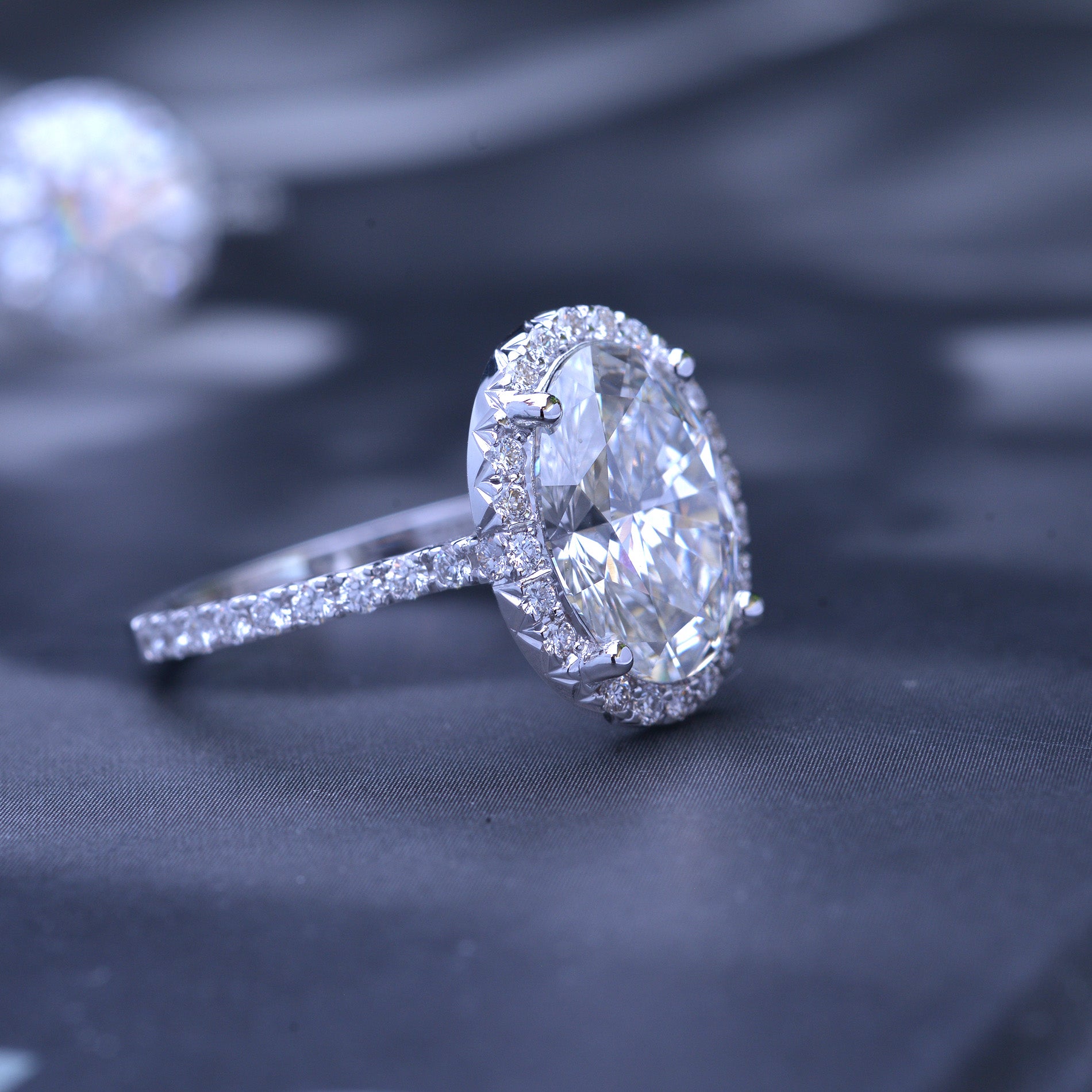 3 carat oval Halo engagement ring french cut pave in white gold with a lab grown diamond