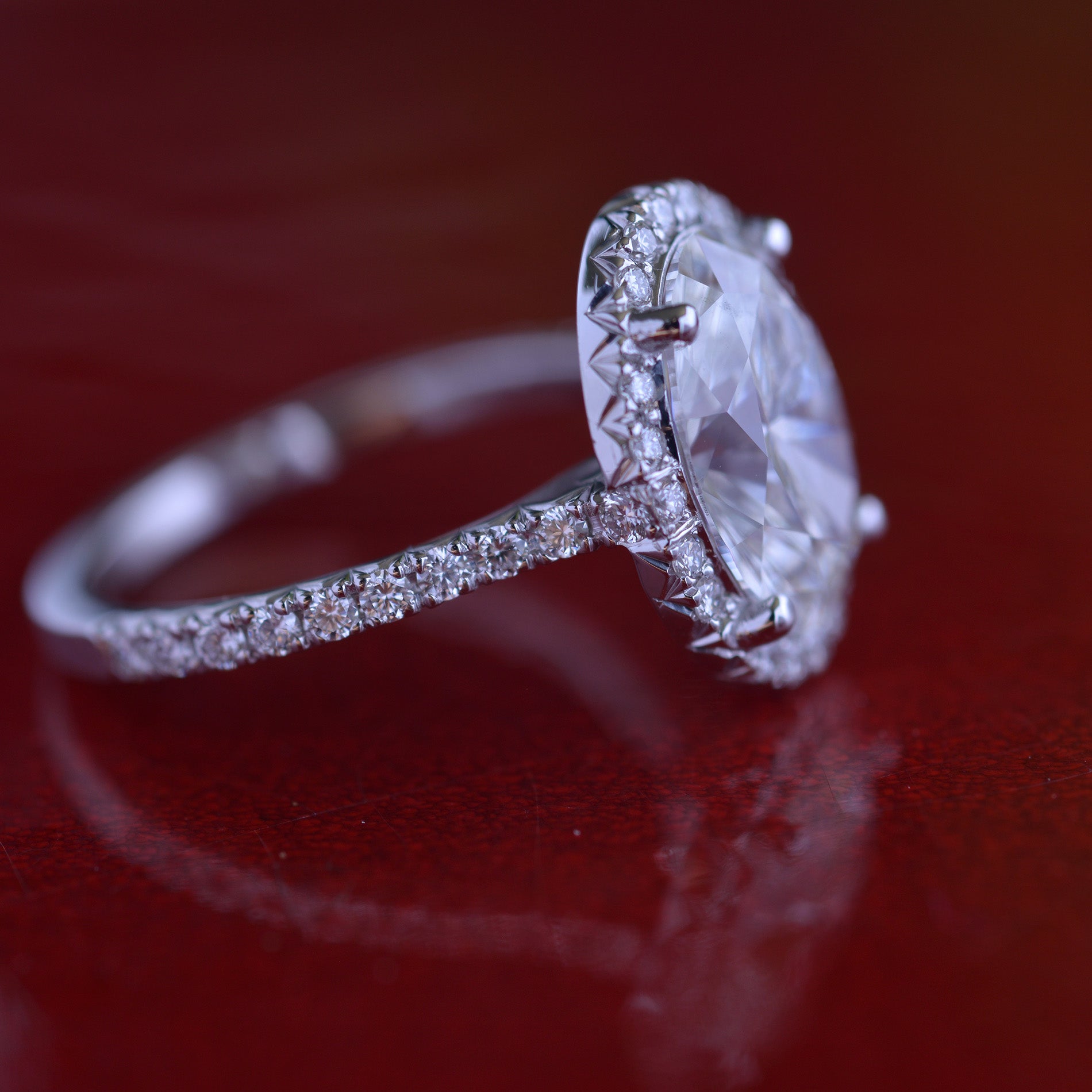 3 carat oval Halo engagement ring french cut pave in white gold with a lab grown diamond side view