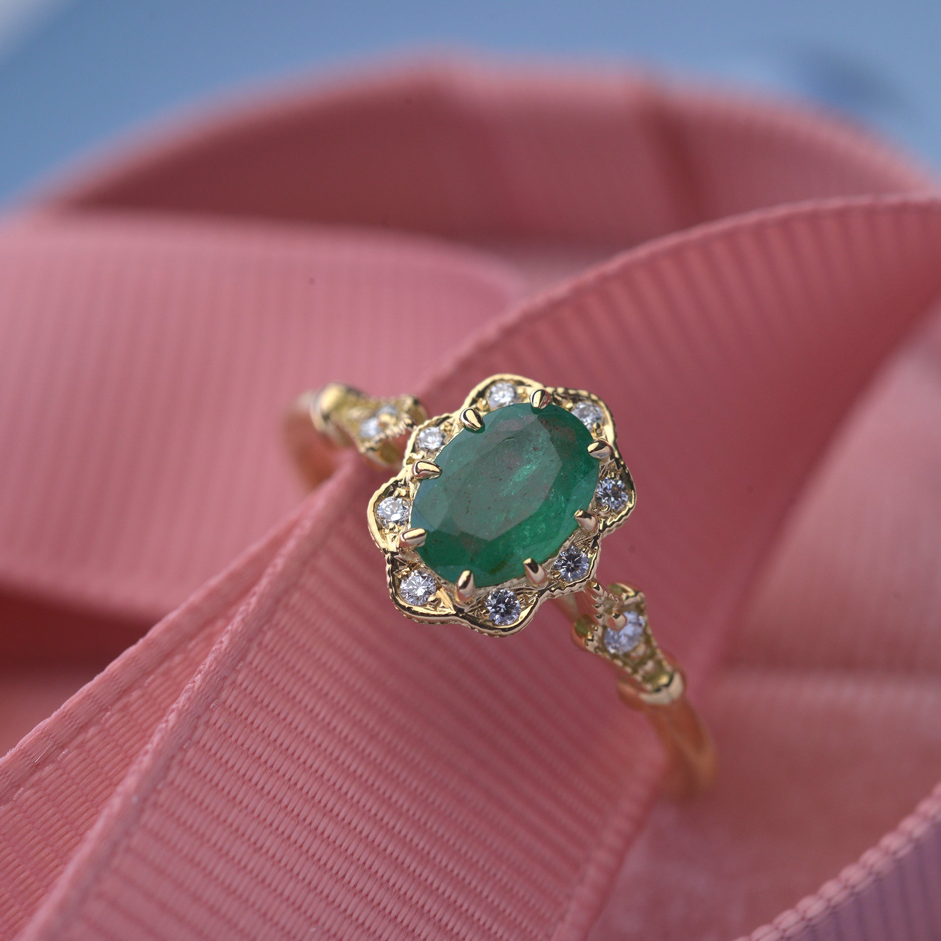 Natural oval green emerald engagement ring