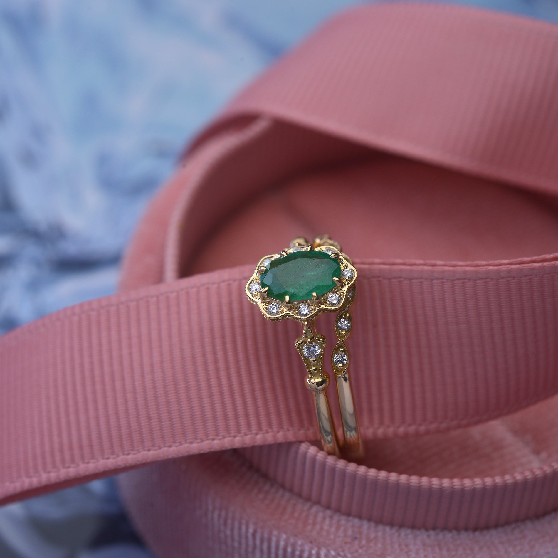 Natural oval green emerald engagement ring