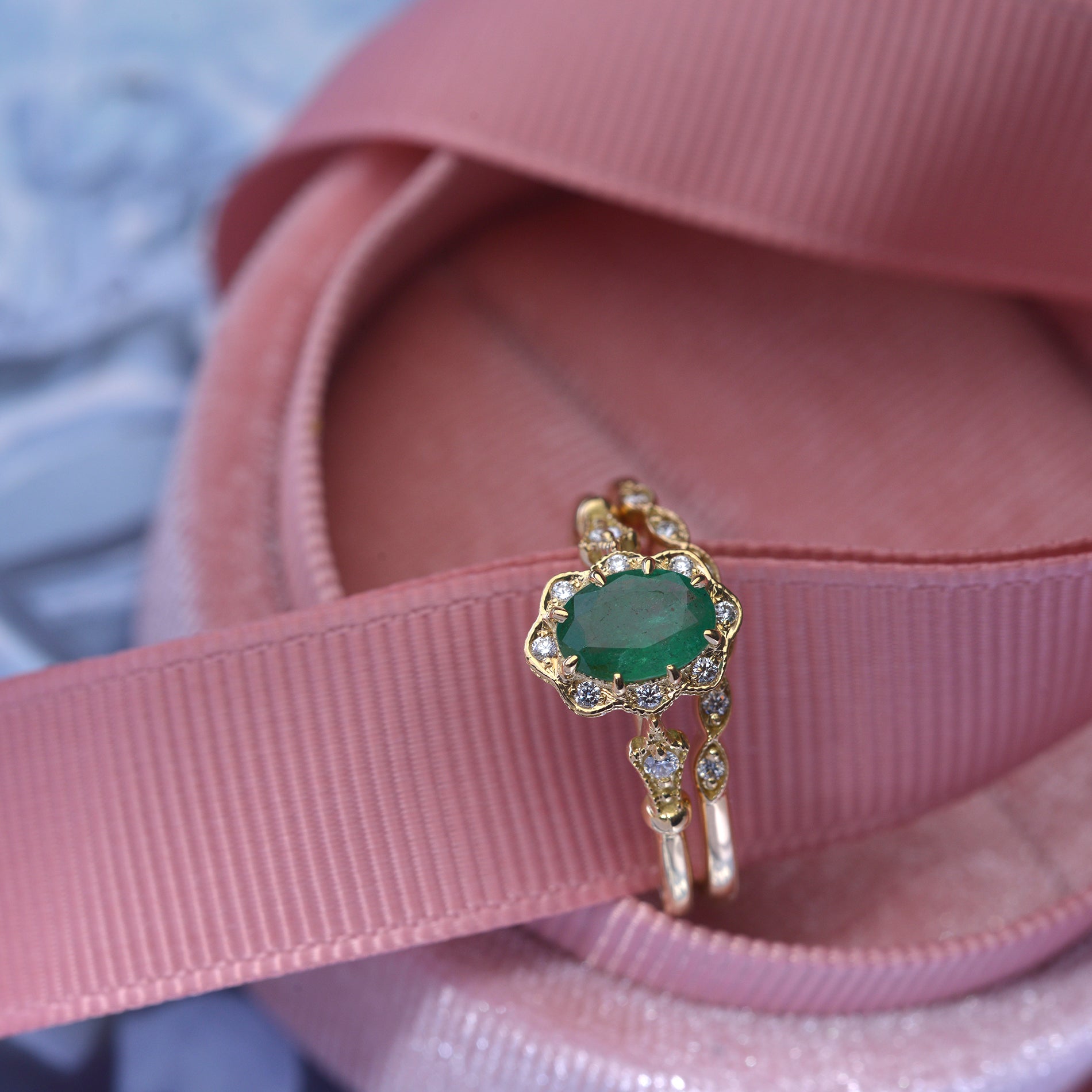 Natural oval green emerald engagement ring