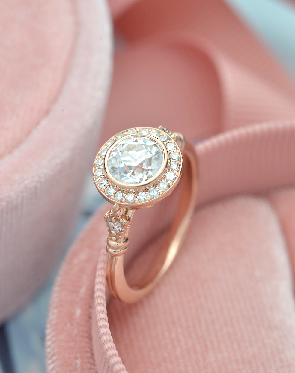 round bezel halo vintage look engagement ring in rose gold