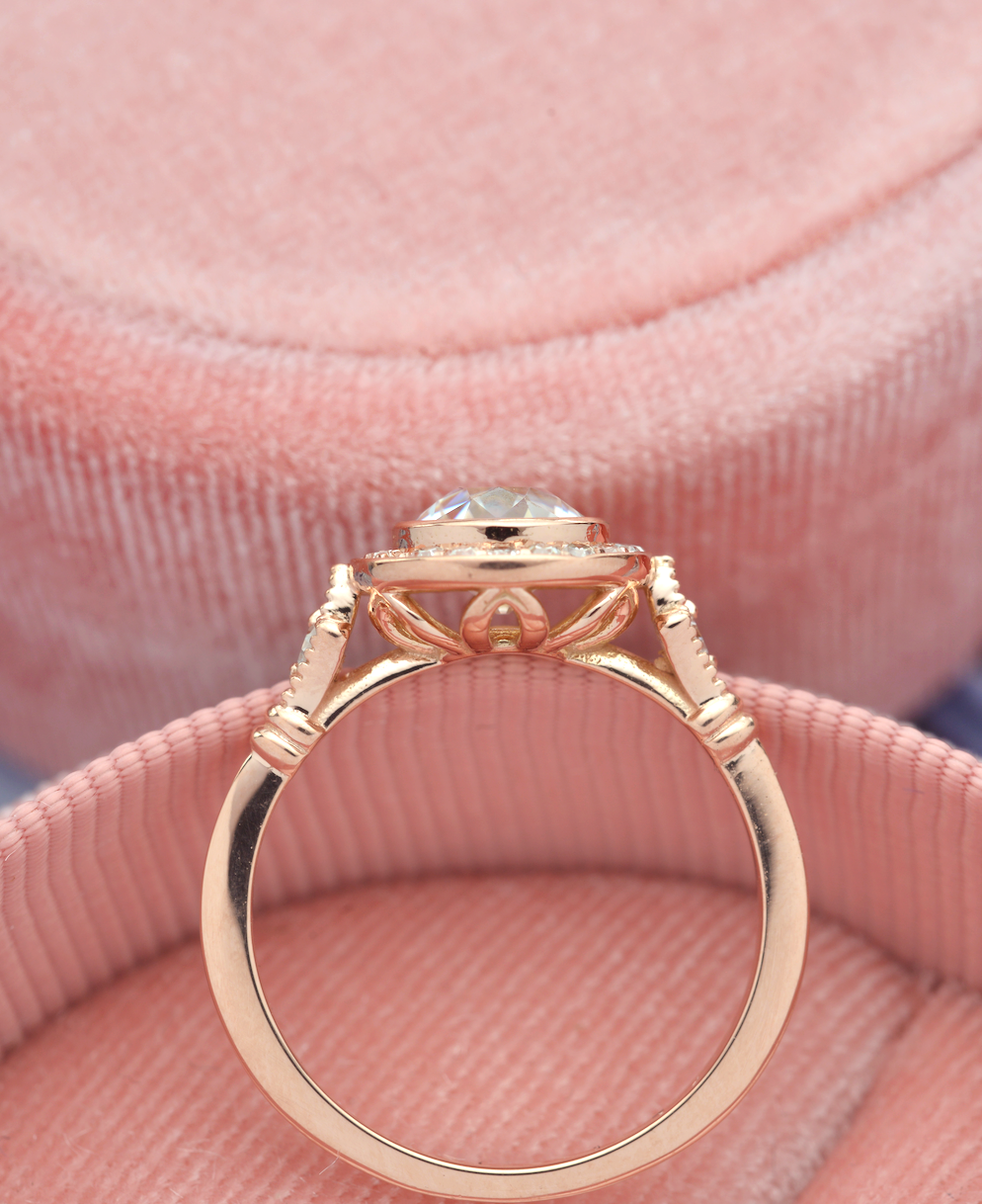 round bezel halo vintage look engagement ring in rose gold