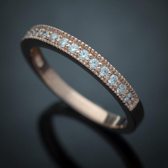 rose gold band with diamonds half way 