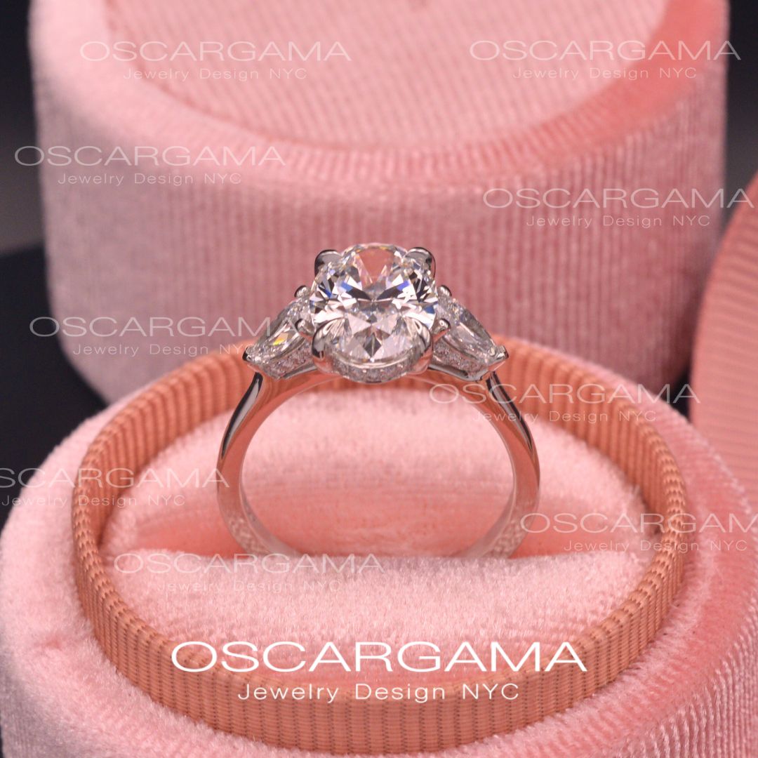 Classic 3 stone Oval with Pear Shape diamonds