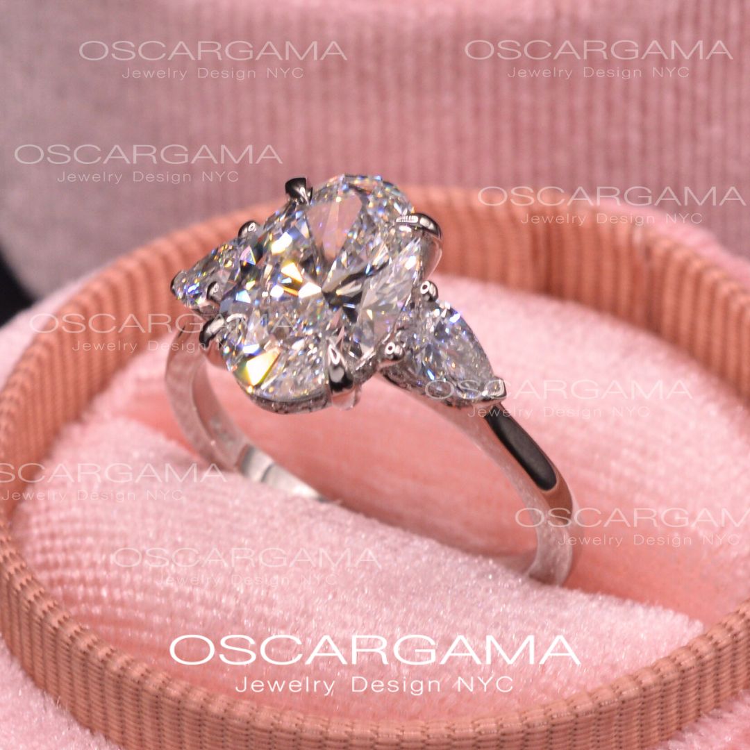 Classic 3 stone Oval with Pear Shape diamonds