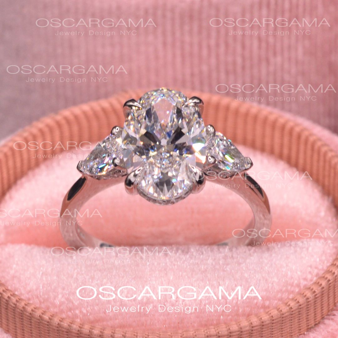 Classic 3 stone Oval with Pear Shape diamonds