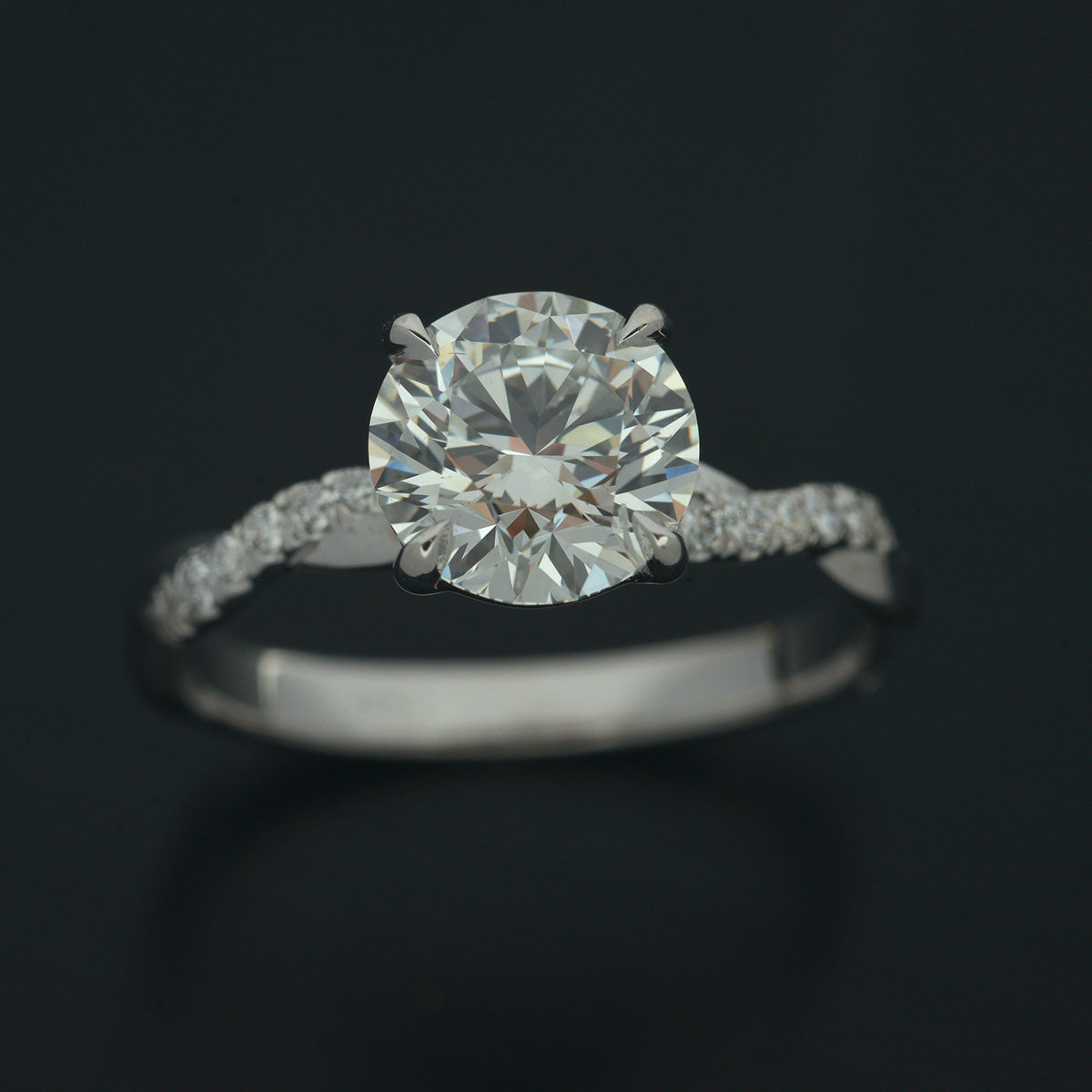 solitaire engagement ring twist band with diamonds