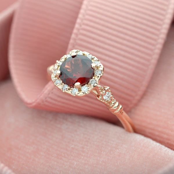 rose gold cushion halo engagement ring red garnet red center