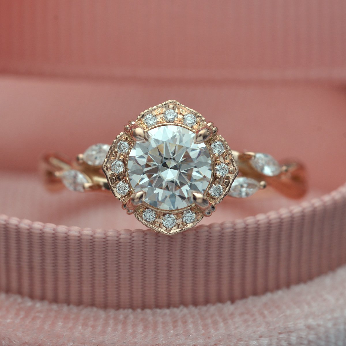 Rose gold engagement ring vintage inspired halo with a vine twist band