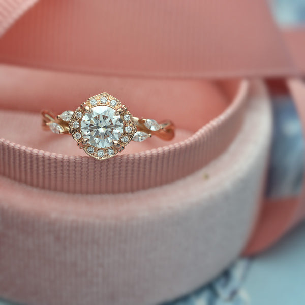 Rose gold engagement ring vintage inspired halo with a vine twist band with marquisess