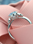 Oval blue aqua marine engagement ring front view 