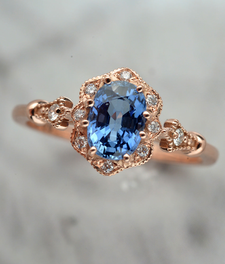 Rose Gold Engagement Ring with cornflower blue sapphire