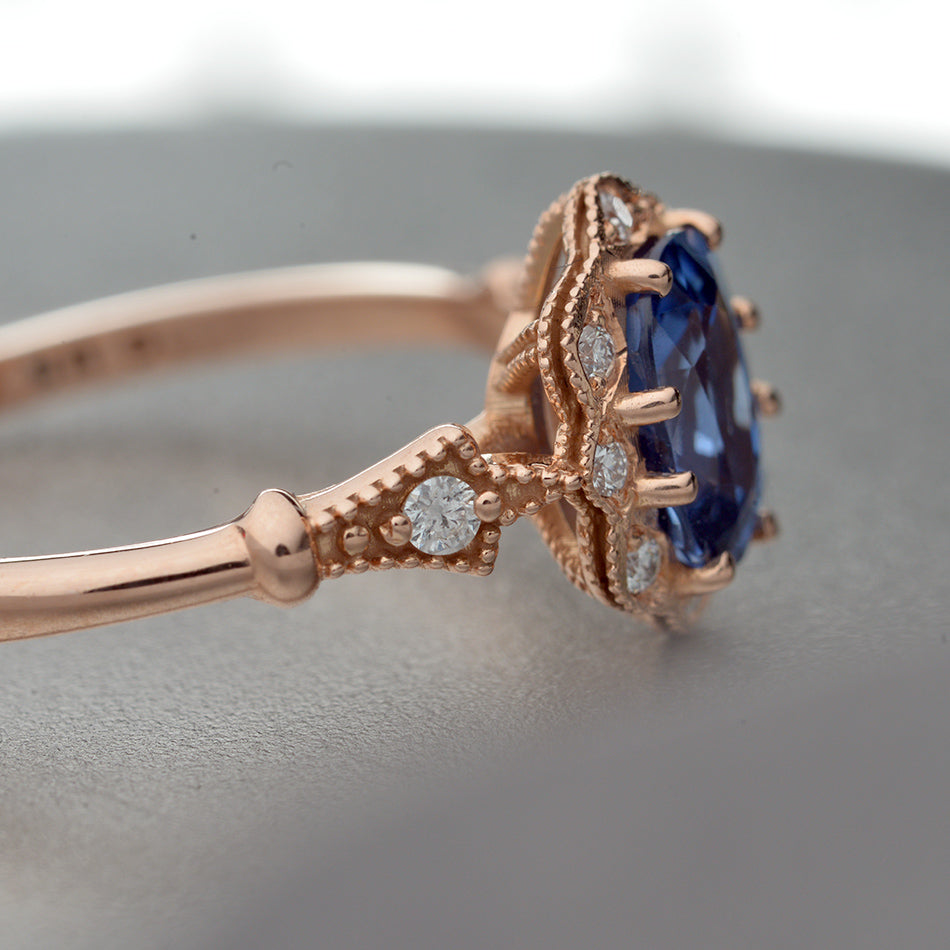 Rose Gold Engagement Ring with cornflower blue sapphire