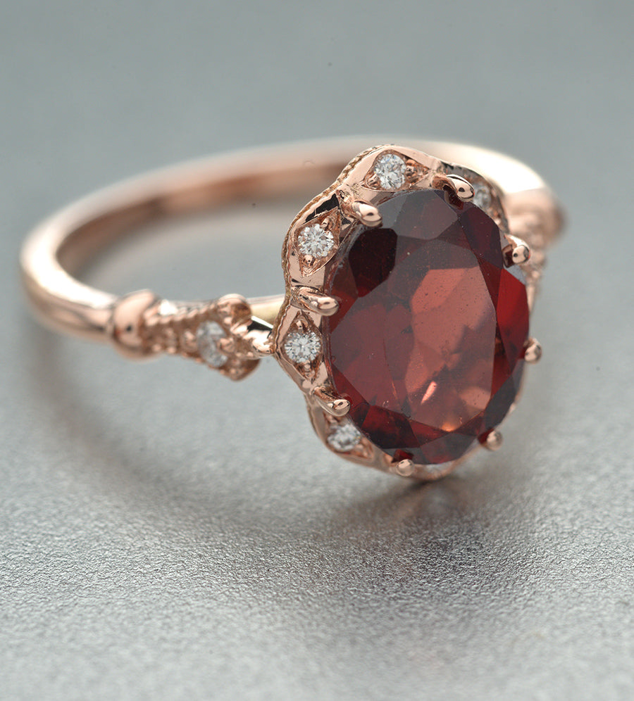 red garnet oval halo rose gold engagement ring vintage look