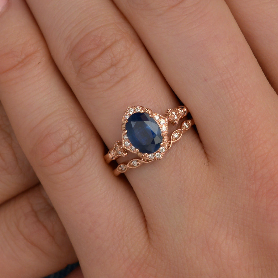 Blue Sapphire Vintage engagement Ring in hand