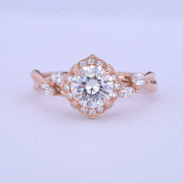 Rose gold engagement ring vintage inspired halo with a vine twist band with marquisess