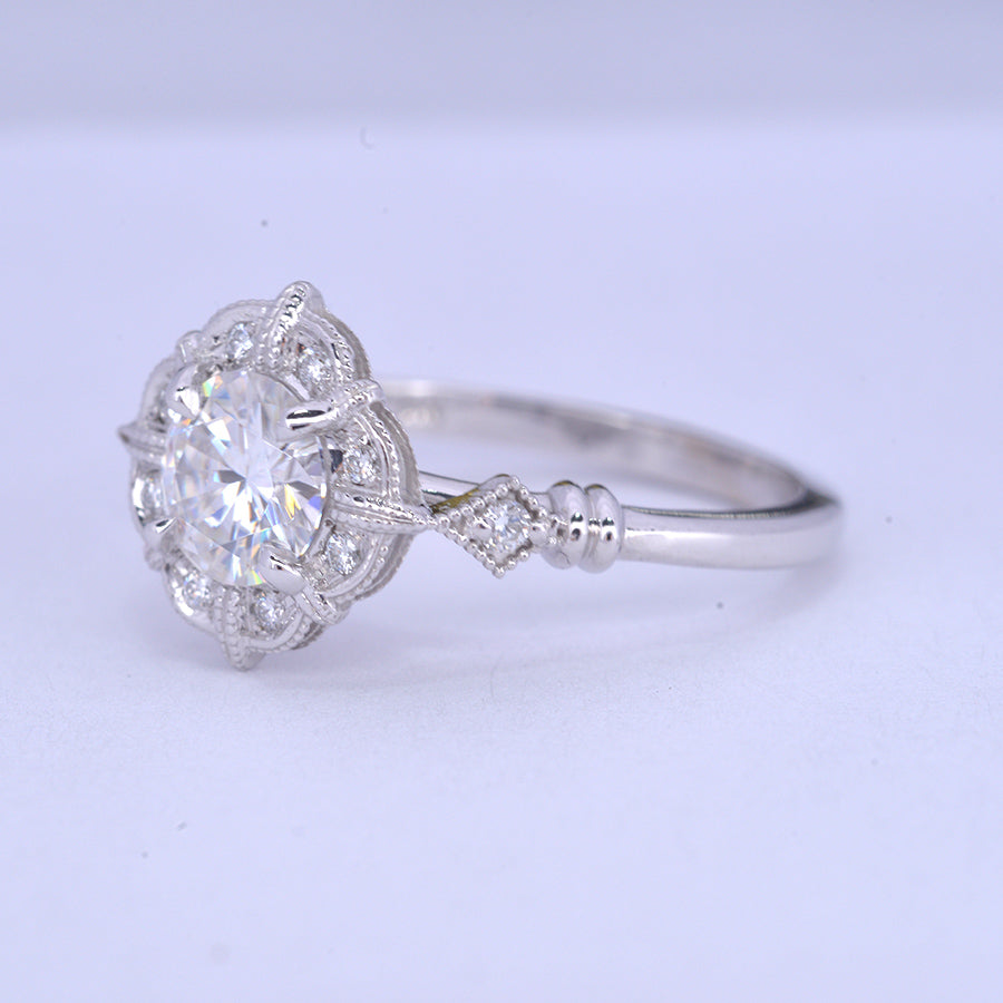 round halo vintage look engagement ring in withe gold