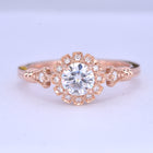 round halo vintage inspired engagement ring in rose gold