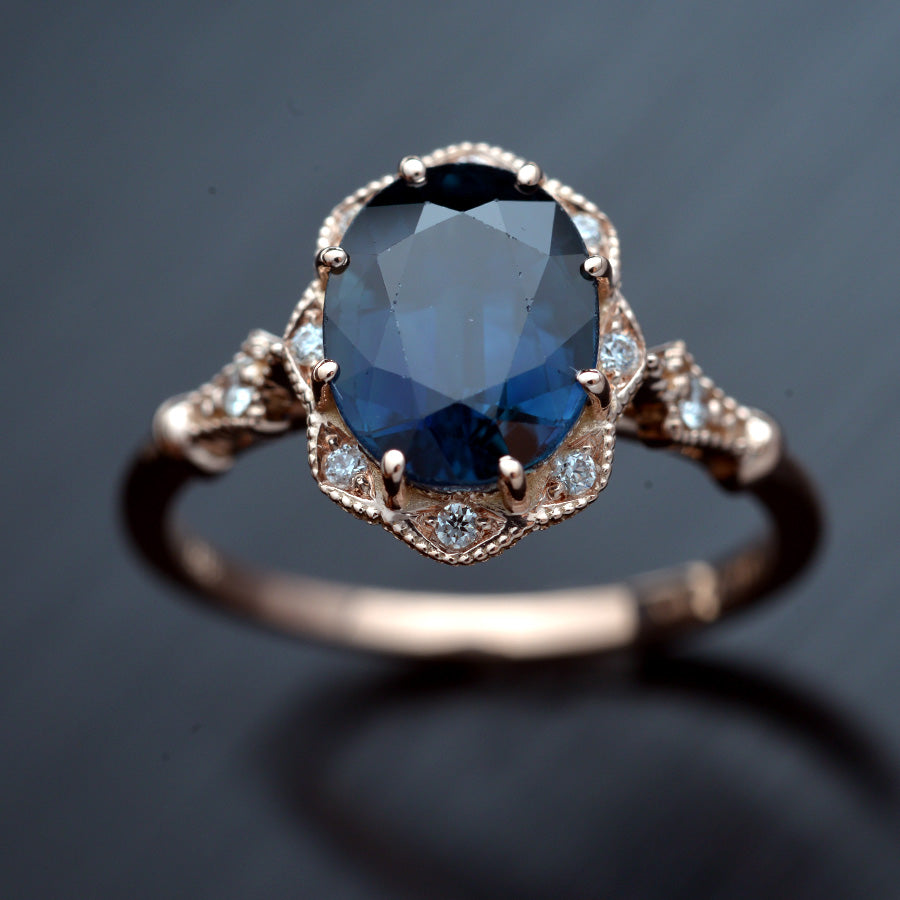 rose gold halo oval flower engagement ring vintage style with blue sapphire