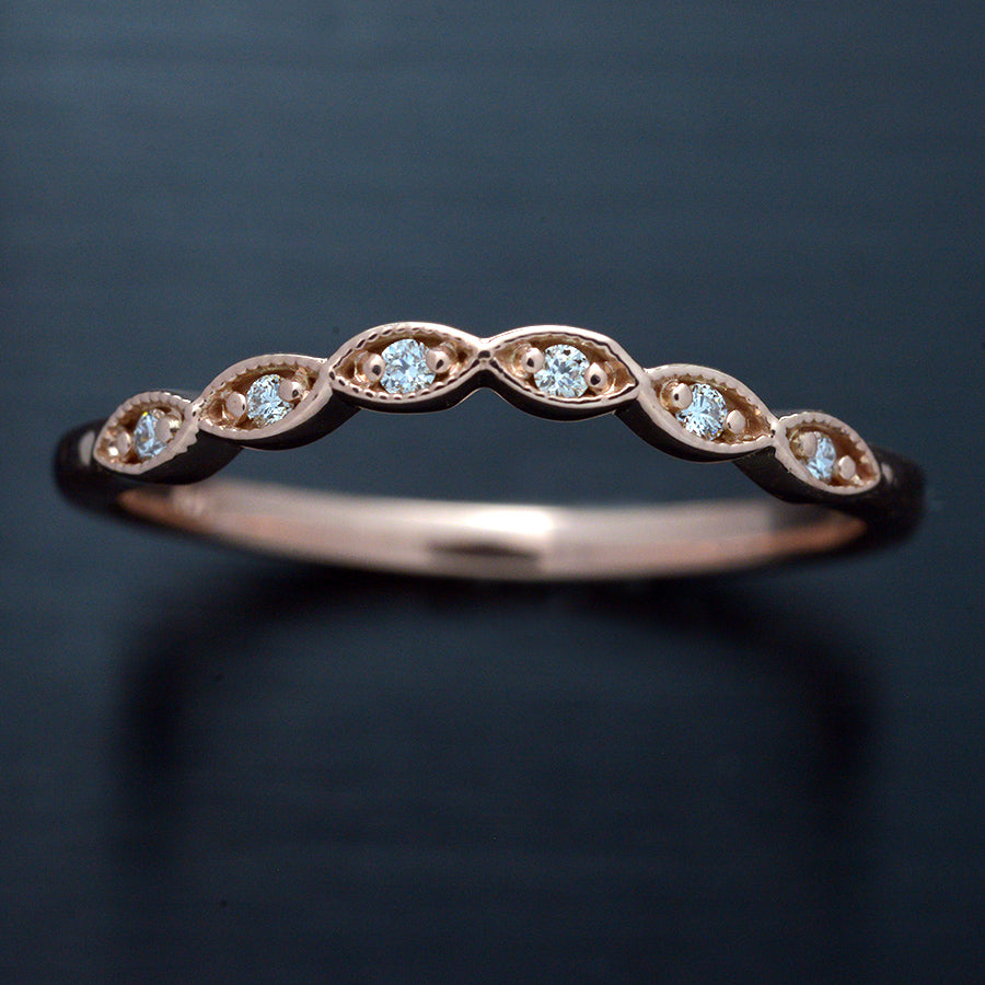 curved scalloped wedding band with 6 diamonds in rose gold