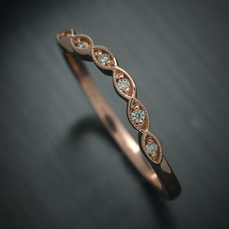 curved scalloped wedding band with 6 diamonds in rose gold