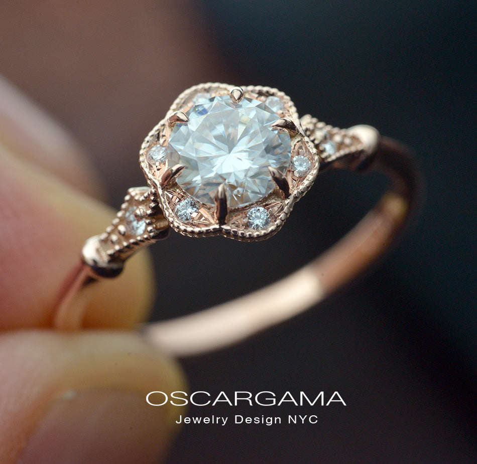 rose gold round halo flower engagement ring with band in a hand