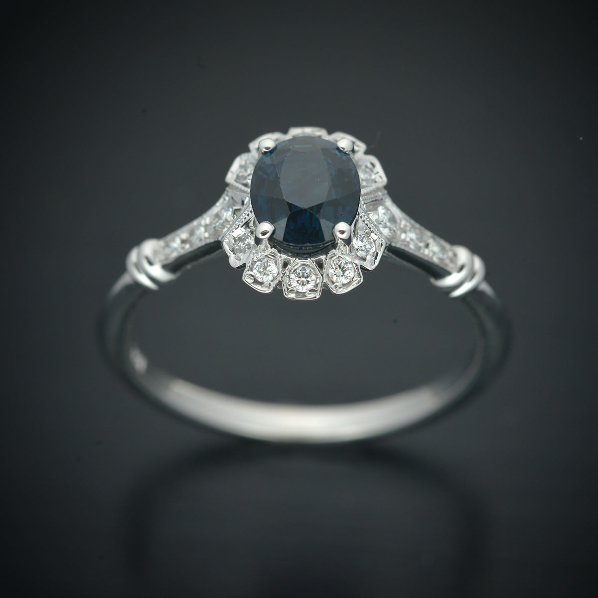 oval blue sapphire engagement ring in white gold vintage look