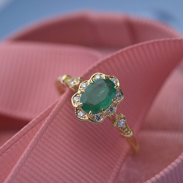 Natural oval green emerald engagement ring 