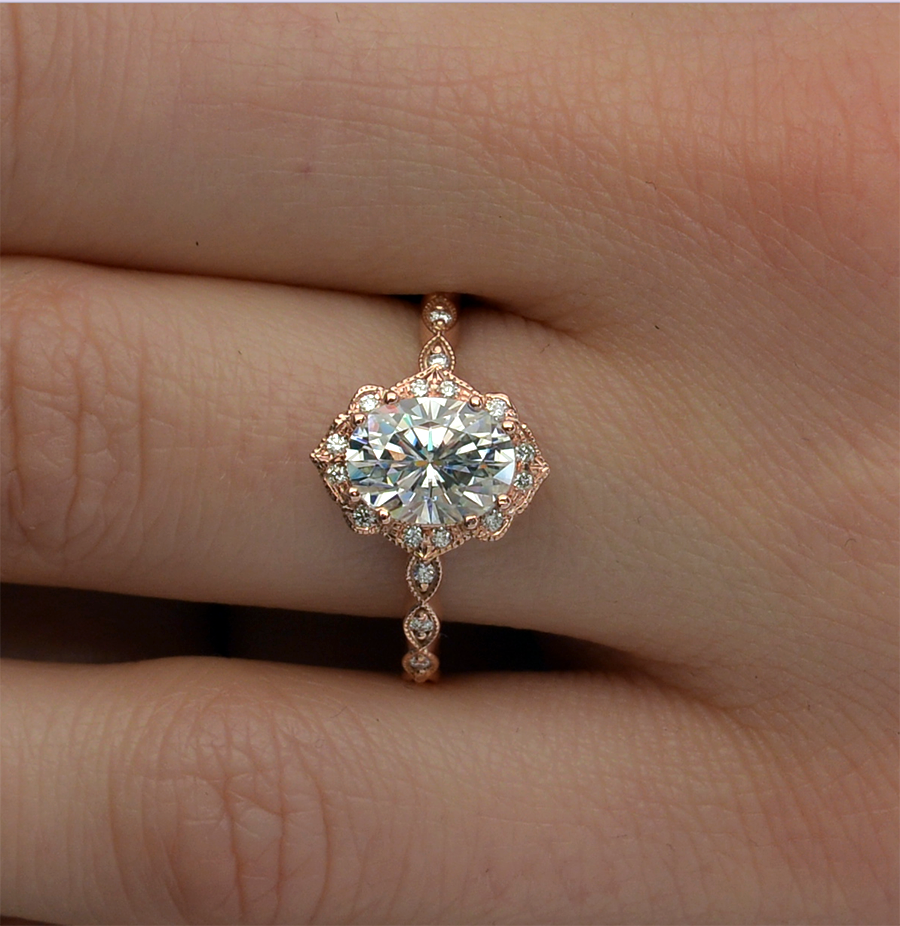 oval halo vintage look rose gold in a hand