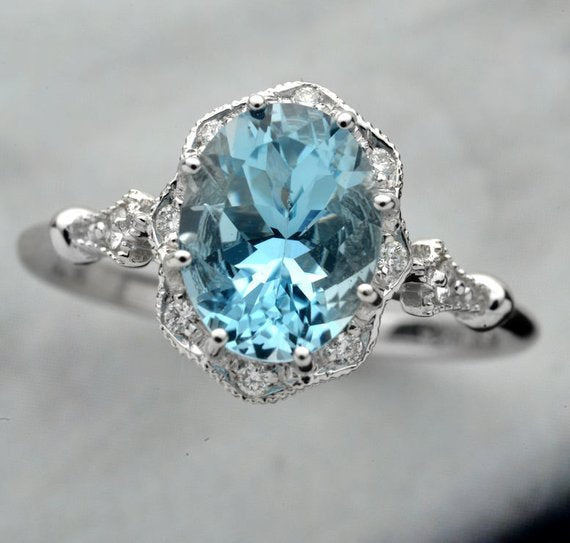 white gold Engagement Ring with blue aqua marine center stone