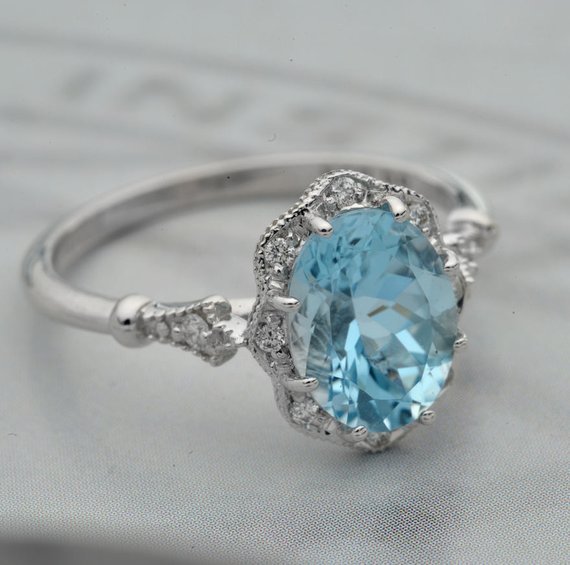 white gold Engagement Ring with blue aqua marine center stone