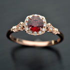 rose gold cushion halo engagement ring red garnet red center