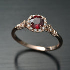 rose gold cushion halo engagement ring red garnet red center